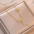 collier papillon d'or