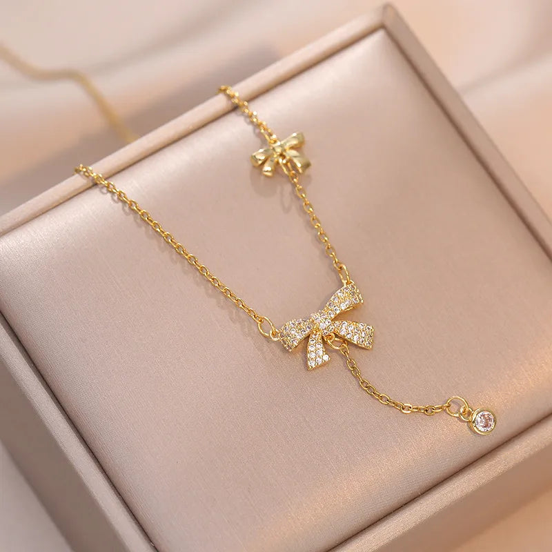 collier papillon d'or